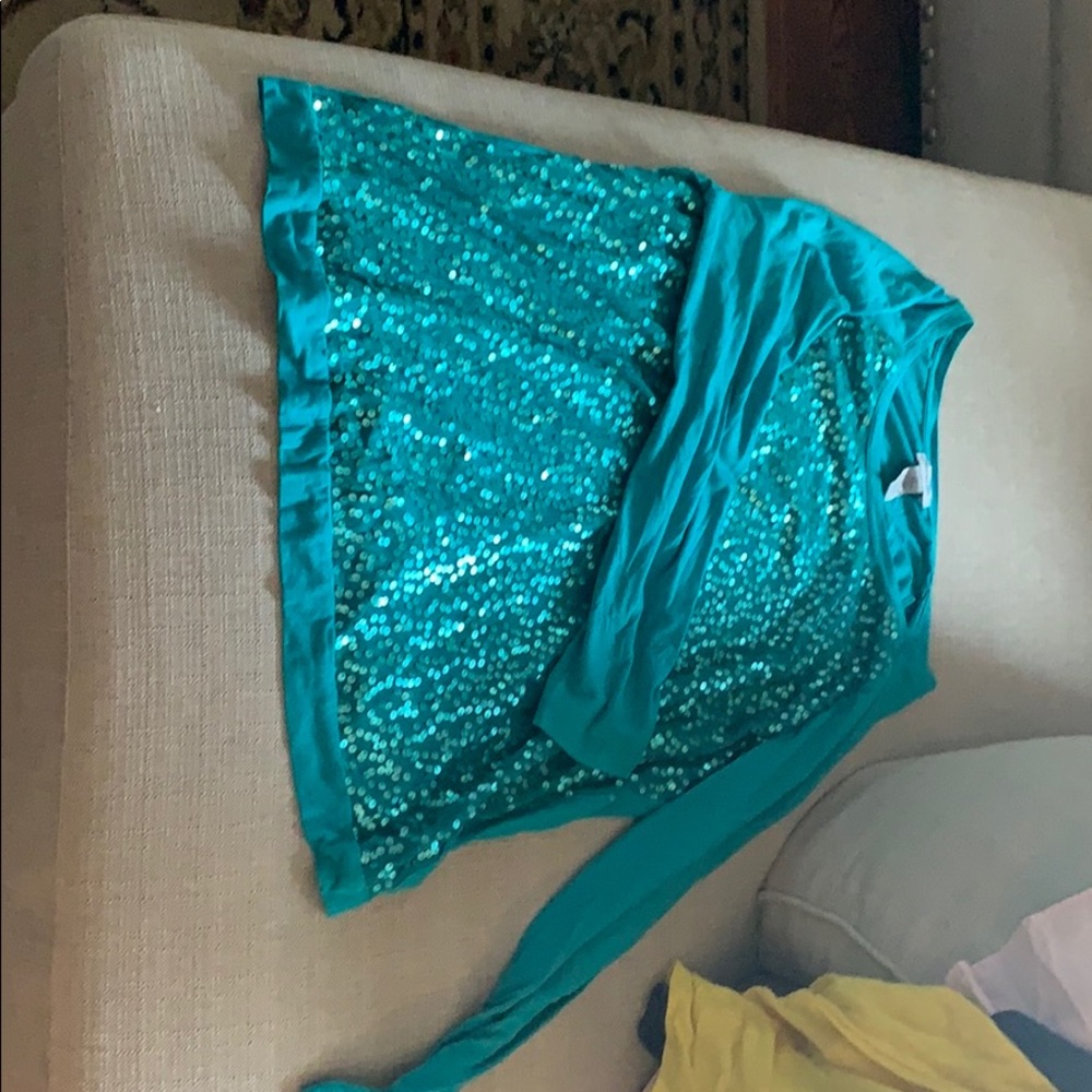 Fun, long sleeve sequin top!